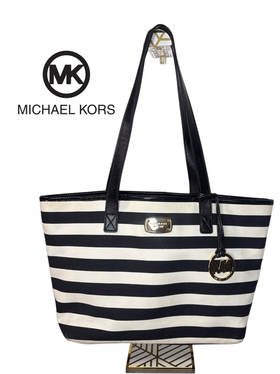 Michael Kors Handbags - Michael Kors Black and White Striped Canvas Tote with Silver MK Charm